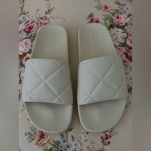 Authentic Bottega Veneta Pool Slides.